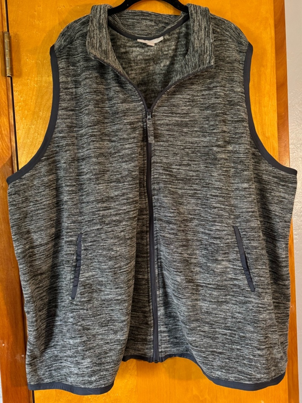 Woman Within Gray Fleece Vest